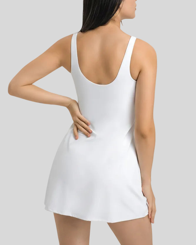 Back view of FormMove Active Dress in white with clean sleeveless design