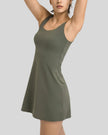 Front angled view of FormMove Active Dress in army green showing lightweight performance fit