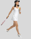 Side view of FormMove Active Dress in white highlighting built-in shorts with pockets