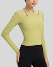 Angled front view highlighting halter neckline and ribbed texture of Athlesi HaloContour top in yellow geen