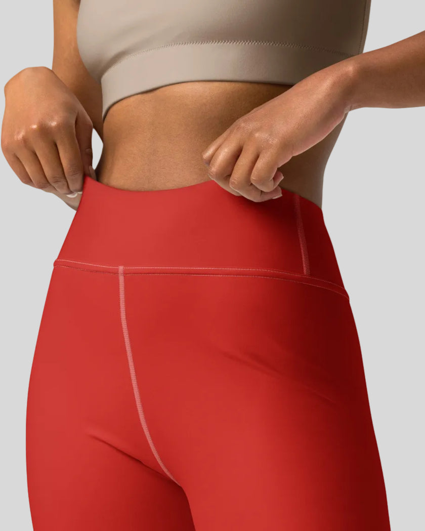 Fabric detail tomato red leggings front view