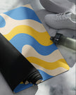 Yoga mat on floor with sneakers cerulean swirl