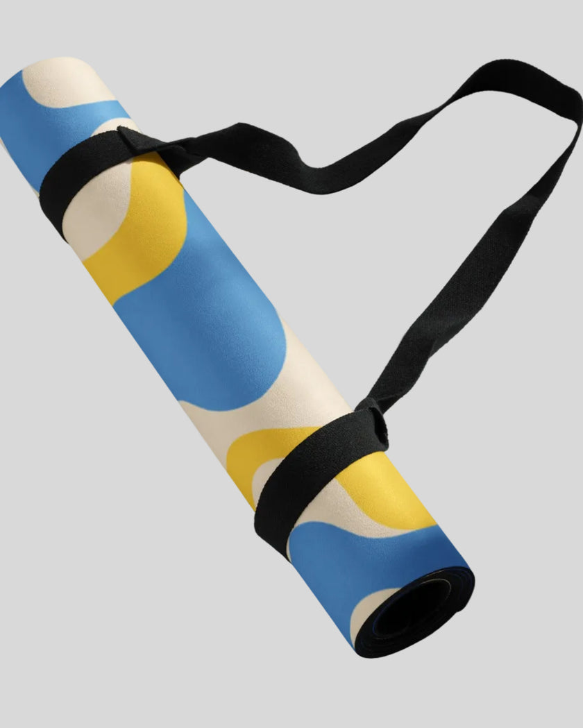 Cerulean swirl yoga mat rolled with carrying strap