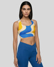 Athlesi model wearing cerulean swirl sports bra right angle