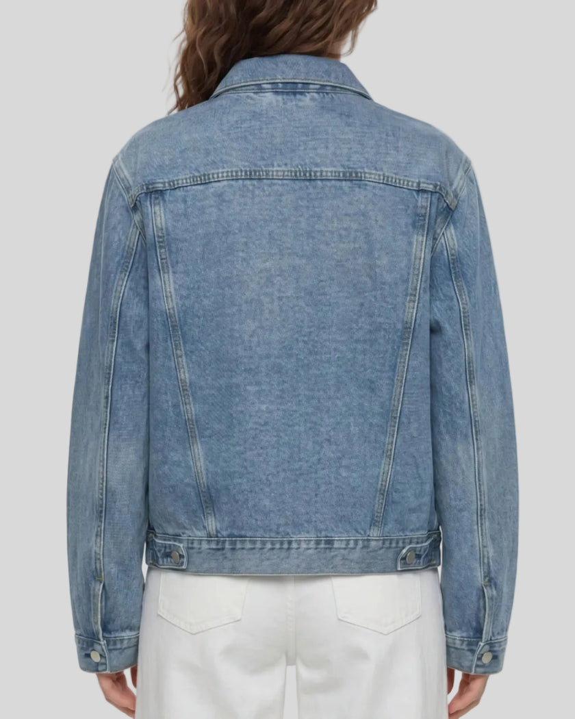 Back view of a model wearing the Heritage Denim Jacket in Blue