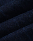 Close-up of the premium vintage washed denim fabric on the Heritage Denim Jacket in Navy Blue