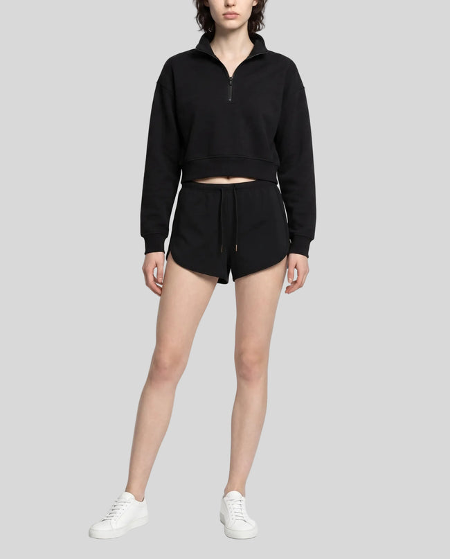 Model wearing the Heritage Lounge Shorts in Black viewed from the front
