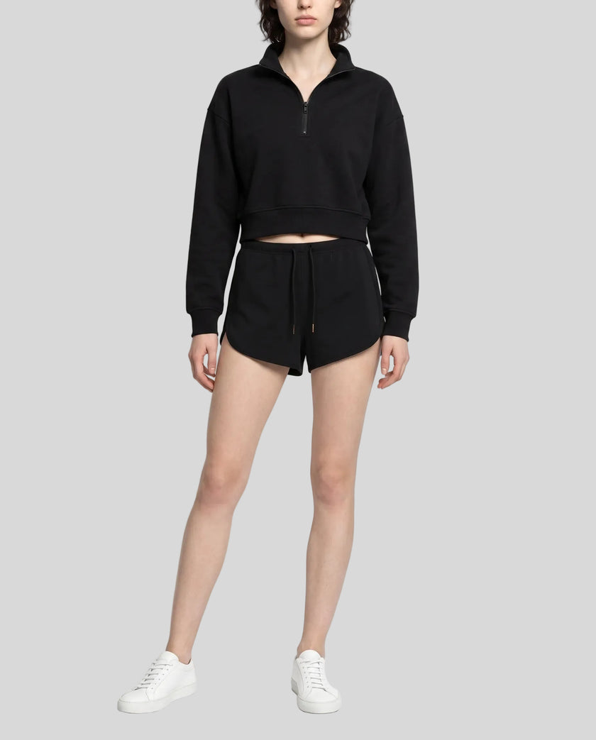 Model wearing the Heritage Lounge Shorts in Black viewed from the front