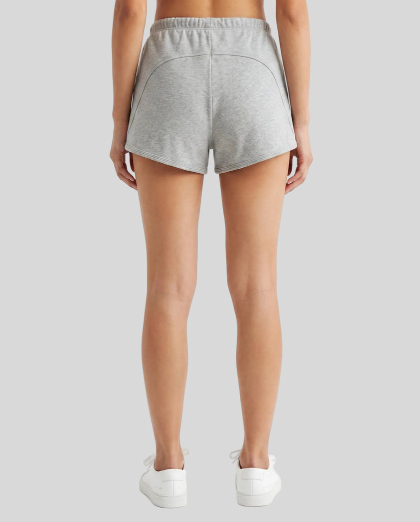 Back view of a model wearing the Heritage Lounge Shorts in Flower Gray