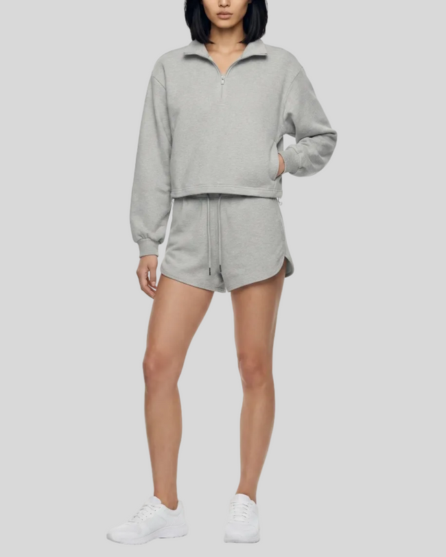 Model wearing the Heritage Lounge Shorts in Flower Gray viewed from the front