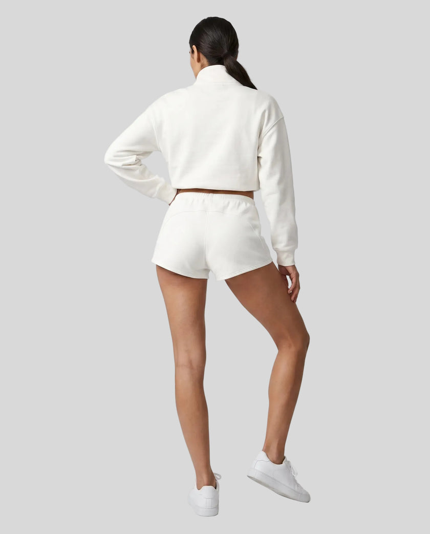 Back view of a model wearing the Heritage Lounge Shorts in White