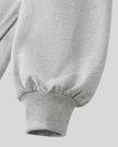 Close-up of flower gray Athlesi Heritage Quarter-Zip Sweatshirt with banded cuffs on a white background