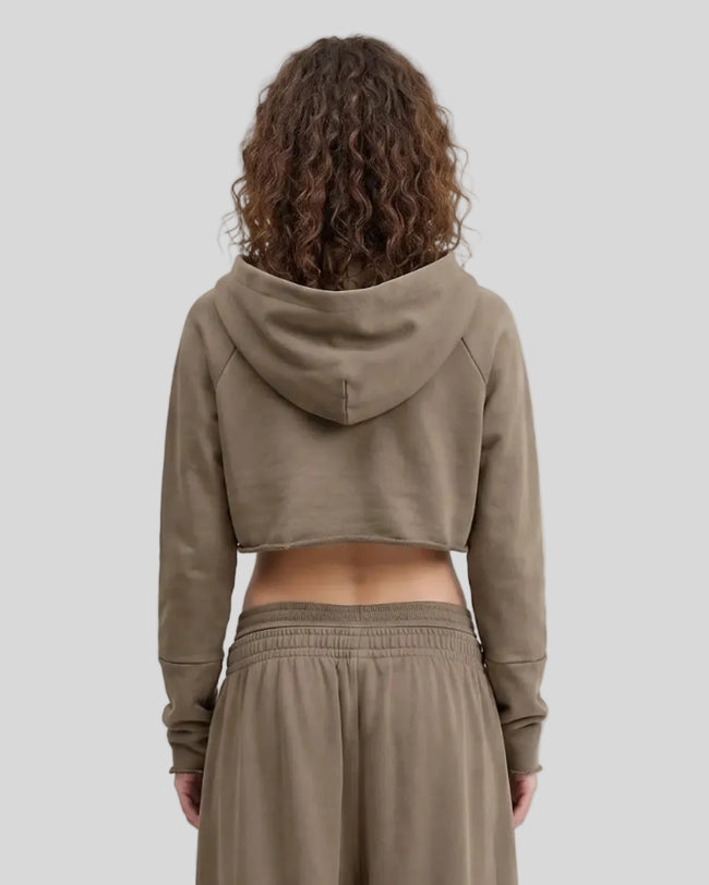 Back view of a model wearing the Heritage Washed Hoodie in Coffee