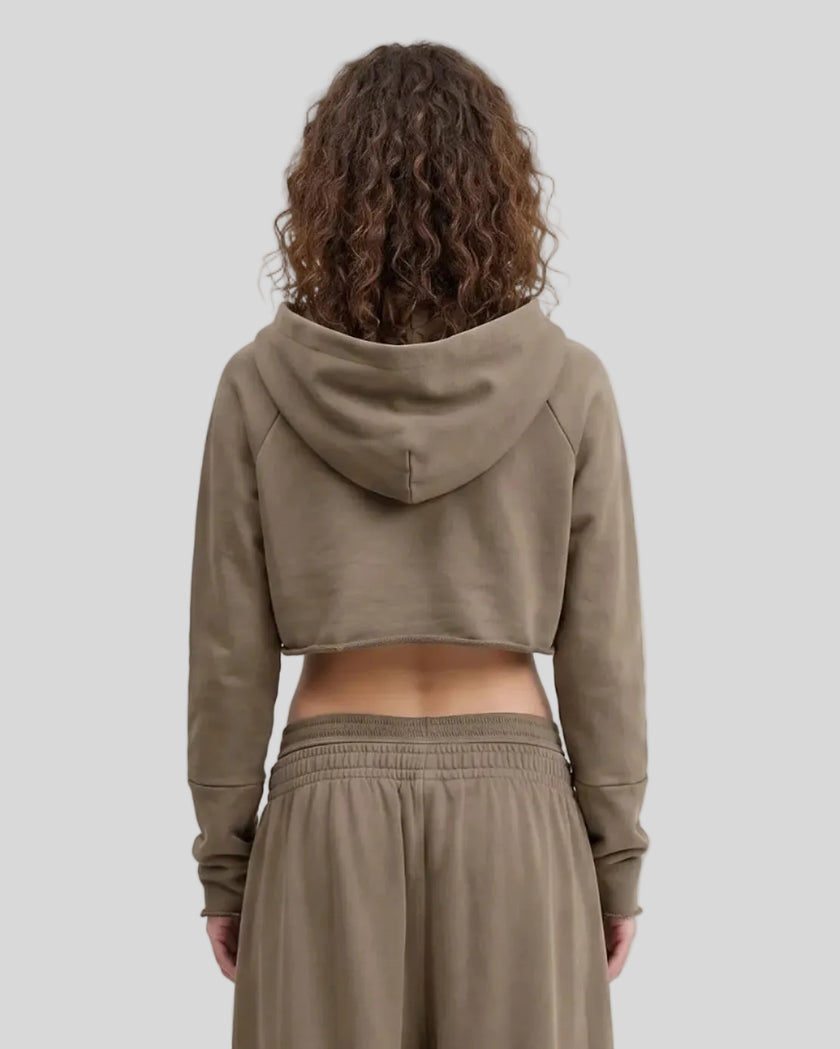 Back view of a model wearing the Heritage Washed Hoodie in Coffee