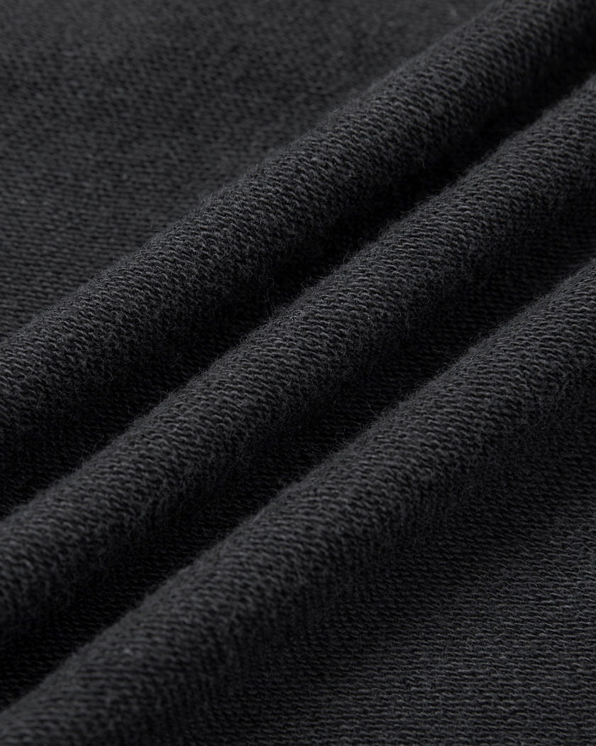Close-up of the vintage washed cotton fabric on the Heritage Washed Hoodie in Dark Gray