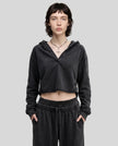 Model wearing the Heritage Washed Hoodie in Washed Black viewed from the front