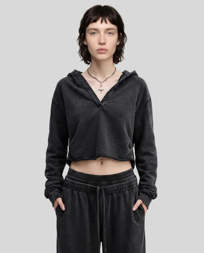 Model wearing the Heritage Washed Hoodie in Washed Black viewed from the front