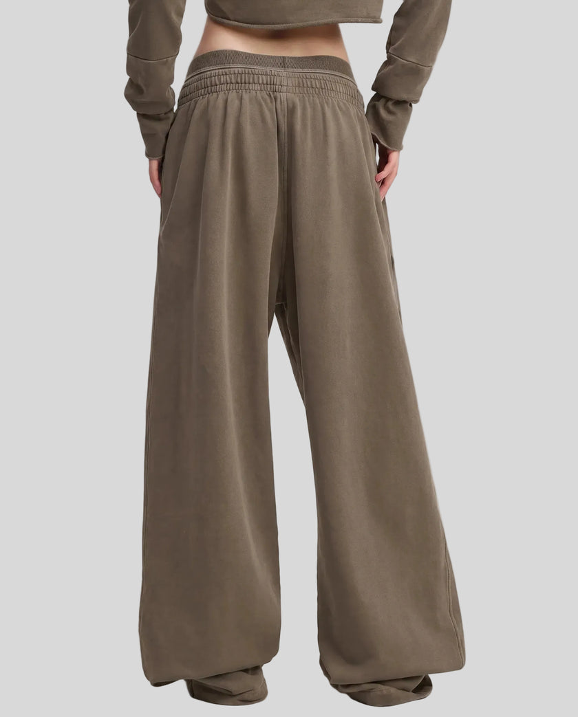 Back view of a model wearing the Heritage Washed Pants in Coffee
