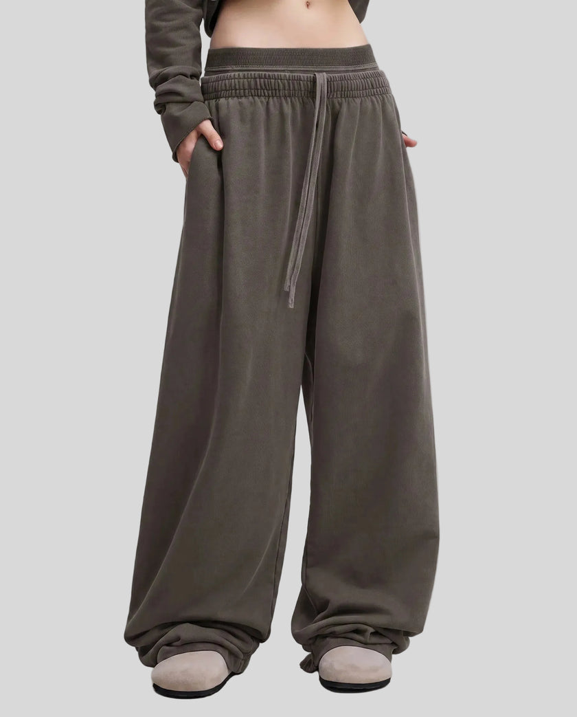 Model wearing the Heritage Washed Pants in Dark Gray viewed from the front