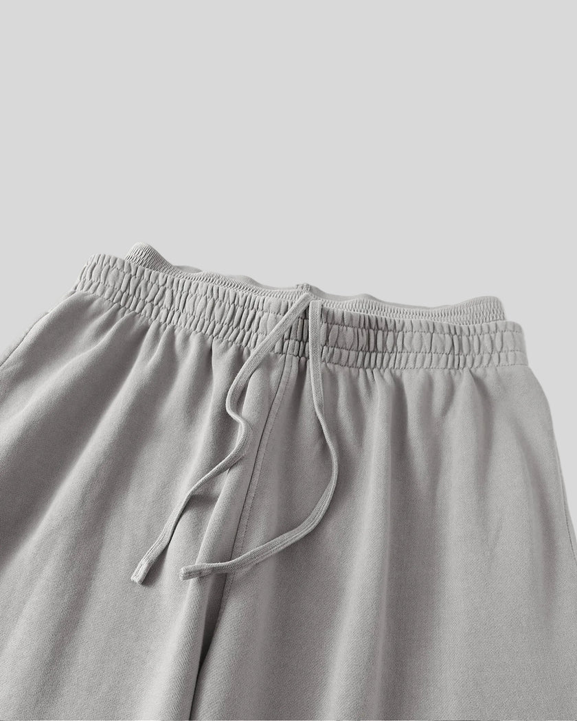 Close-up of the double waistband and adjustable drawstring on the Heritage Washed Pants in Medium Gray