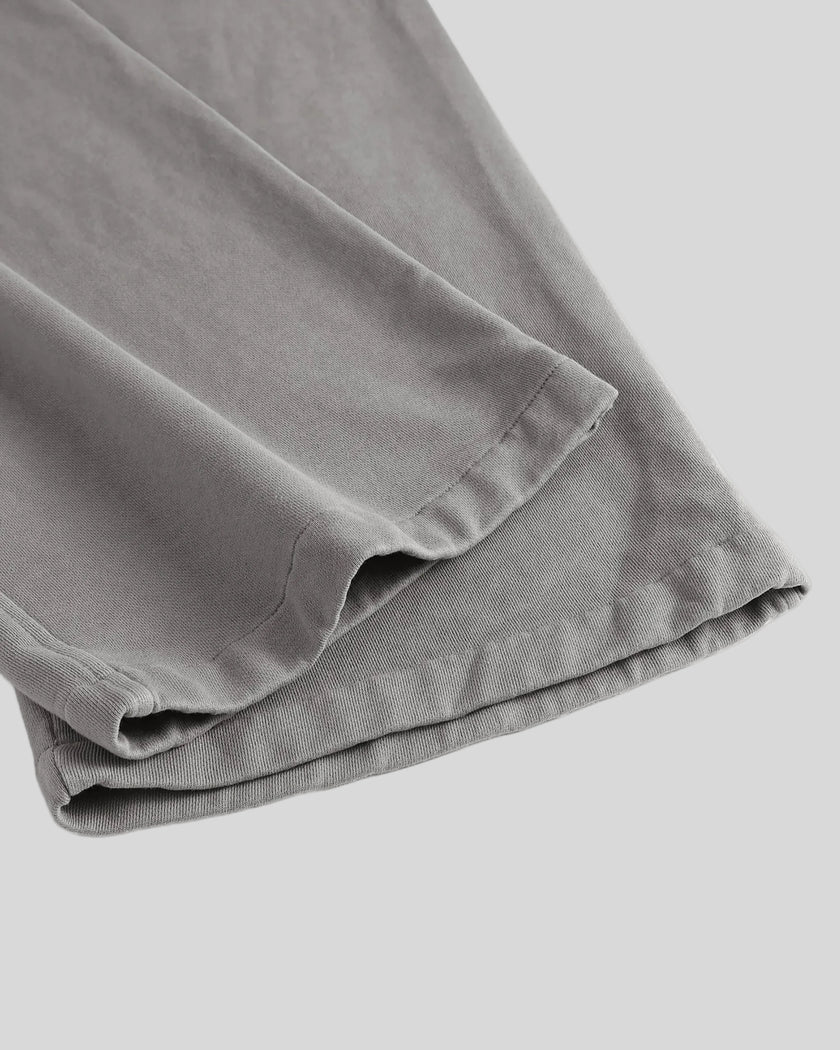 Close-up of the straight-leg hem on the Heritage Washed Pants in Medium Gray