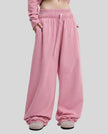Model wearing the Heritage Washed Pants in Rose Pink viewed from the front
