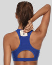 Back-cutout sports bra with integrated phone pocket shown in royal blue