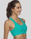 Supportive scoop-neck sports bra shown from right front angle in teal