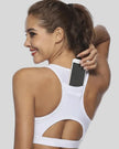 Back-cutout sports bra with integrated phone pocket shown in white