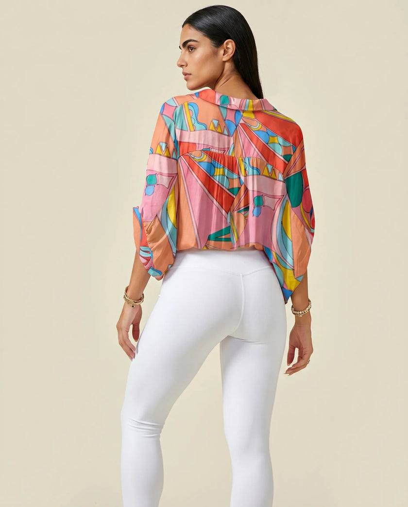 Back view of oversized multicolor printed shirt with relaxed flowing silhouette