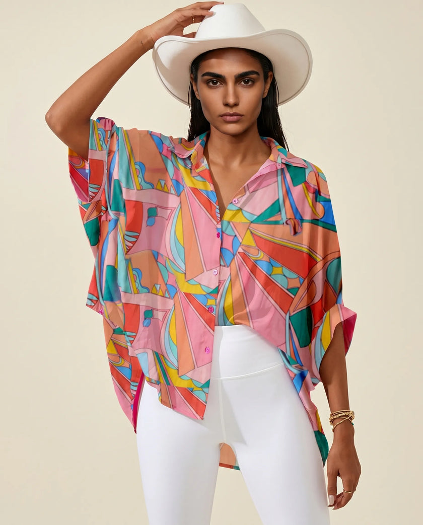 Front view of multicolor oversized button shirt with artistic retro-inspired print