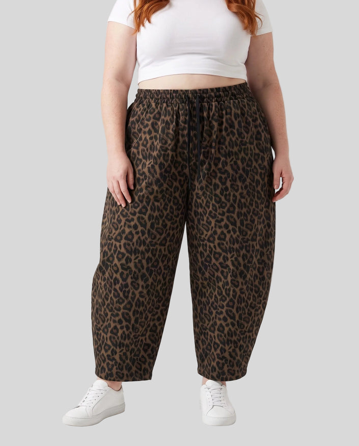 Lower body front view of woman wearing Leopard Accent Barrel Pants in Leopard Brown