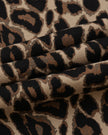 Closeup of Leopard Coffee cotton fabric on Leopard Accent Barrel Pants