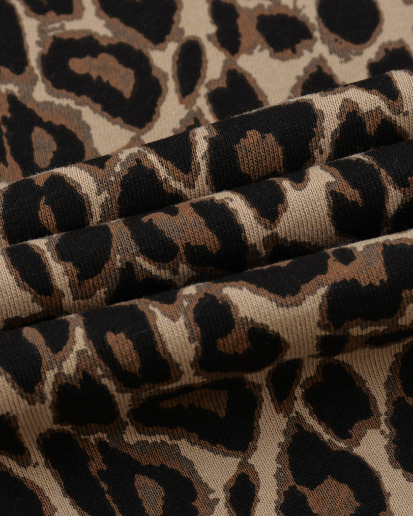 Closeup of Leopard Coffee cotton fabric on Leopard Accent Barrel Pants