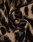 Detailed view of leopard print cotton fabric on Leopard Accent Barrel Pants