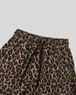 Closeup of elasticized drawstring waist on Leopard Accent Barrel Pants in Leopard Coffee
