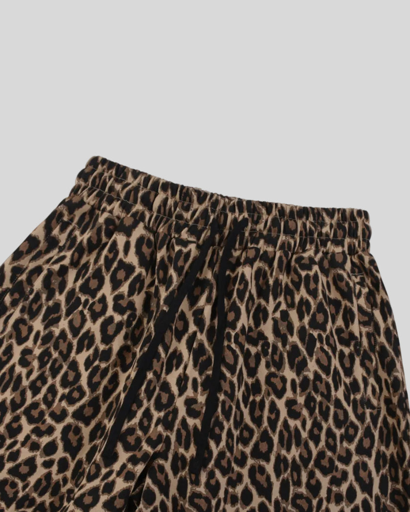 Closeup of elasticized drawstring waist on Leopard Accent Barrel Pants in Leopard Coffee