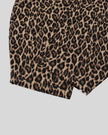 Closeup of barrel-leg hem and leopard print construction on Leopard Accent Barrel Pants