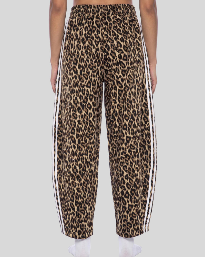 Lower body back view of woman wearing Leopard Accent Barrel Pants with contrast white side stripes