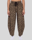 Lower body front view of woman wearing Leopard Accent Barrel Pants in Leopard Coffee