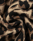Detailed view of leopard print cotton fabric and construction on Leopard Accent Hoodie