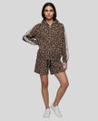 Full body front view of woman styled in Leopard Accent Hoodie and matching Leopard Accent Shorts in Leopard Coffee
