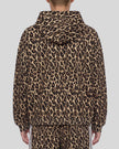 Upper body back view of woman wearing Leopard Accent Hoodie with oversized hood in Leopard Coffee