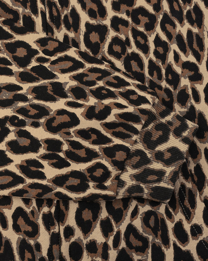 Closeup of leopard print sleeve, contrast white stripes and ribbed cuff on Leopard Accent Hoodie