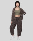 Full body front view of woman styled in Leopard Accent Hoodie and matching Leopard Accent Pants in Leopard Light Taupe