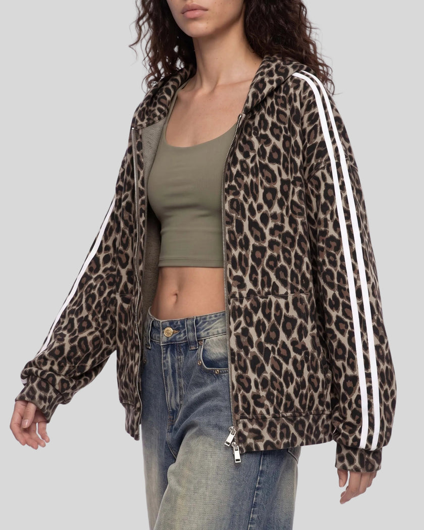 Upper body front angle view of woman wearing Leopard Accent Hoodie open in Leopard Light Taupe
