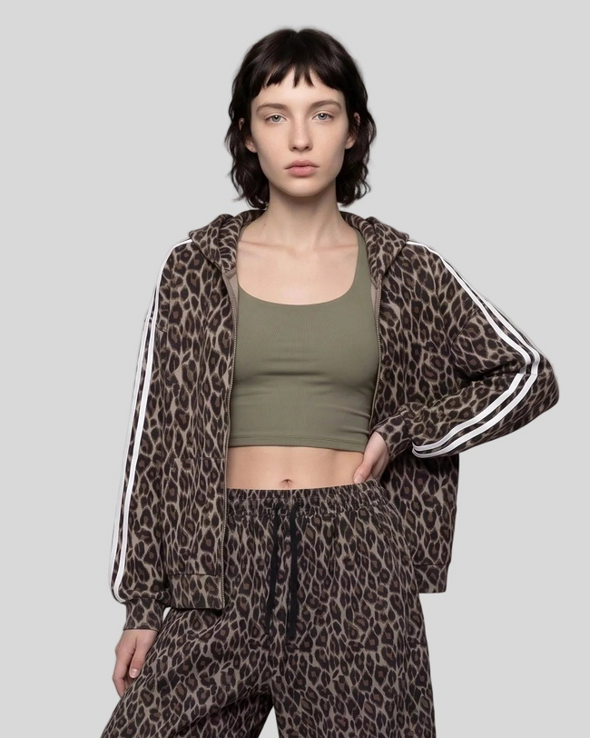 Upper body front view of woman wearing Leopard Accent Hoodie open in Leopard Light Taupe
