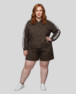 Full body front view of woman styled in Leopard Accent Shorts in Leopard Brown