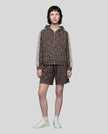Full body front view of woman styled in Leopard Accent Shorts in Leopard Light Taupe