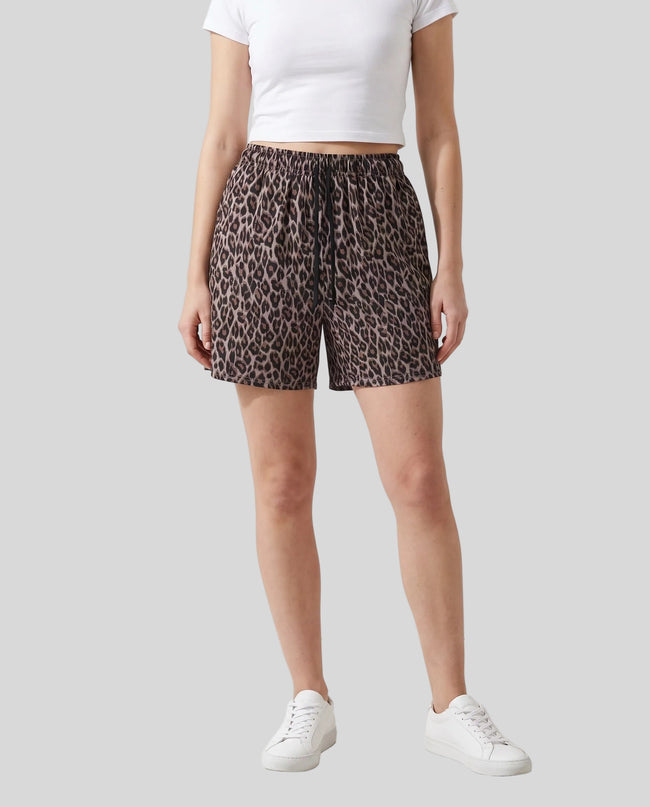 Lower body front view of woman wearing Leopard Accent Shorts in Leopard Light Taupe